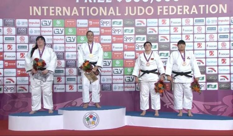 11 cüdoçuya 2 medal