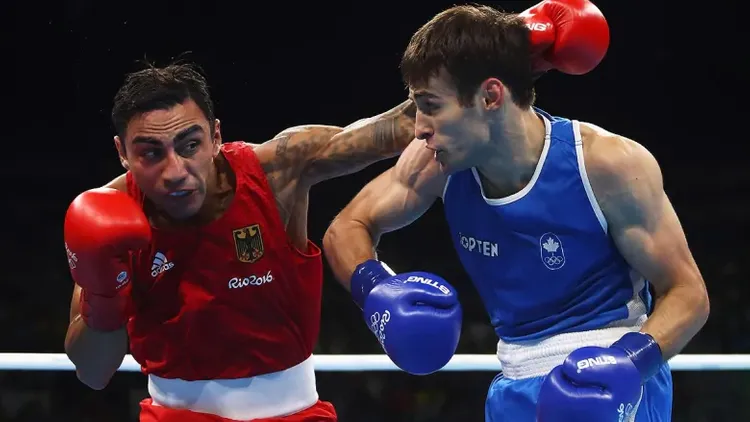 Virus düşdü, boksçuların planları pozuldu