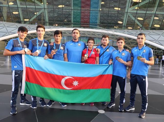 Riqada uğura imza atan cüdoçularımız Bakıya döndü - FOTOSESSİYA